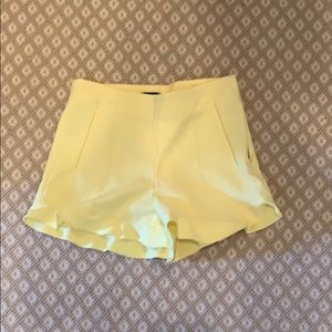 Frilly yellow shorts